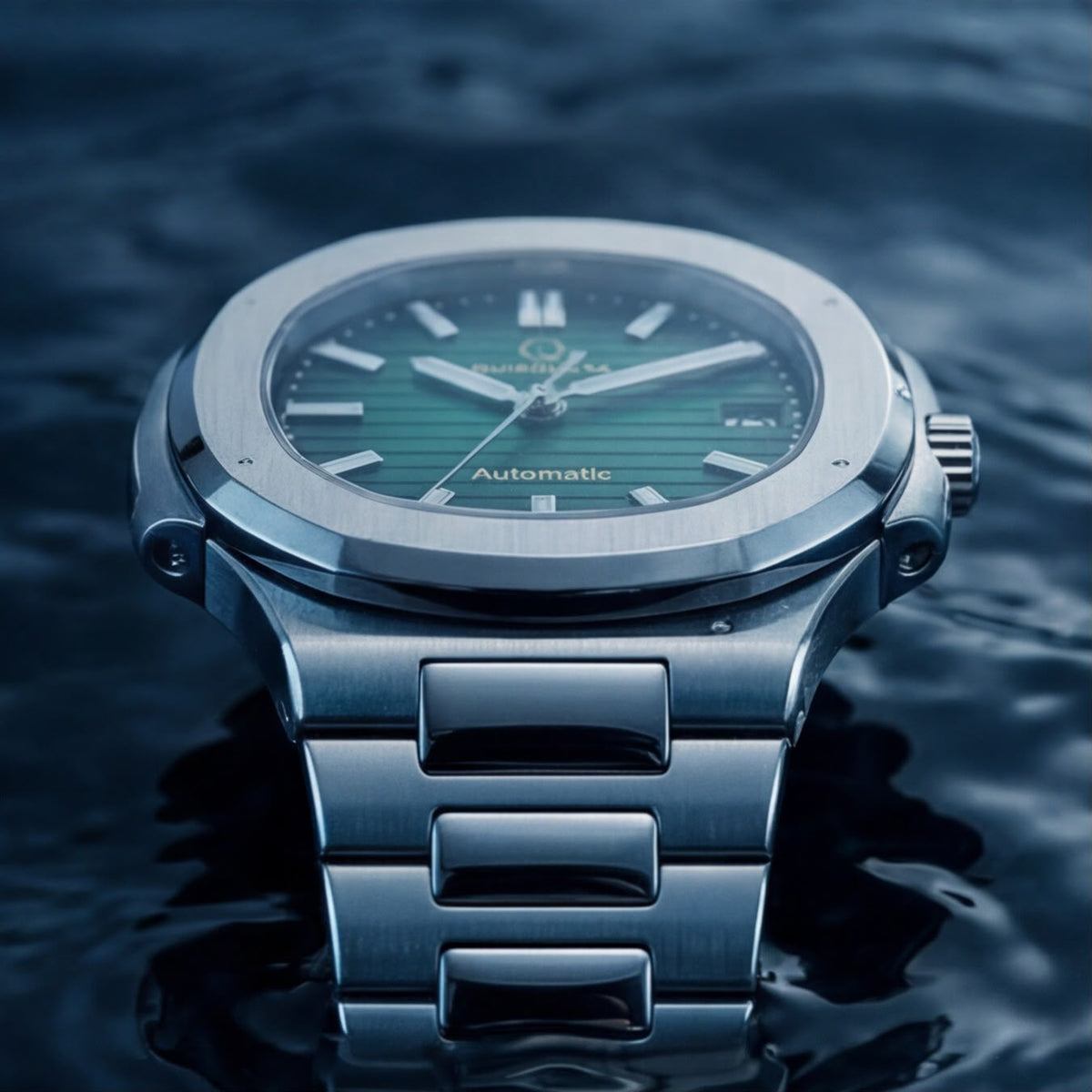 A stainless steel wristwatch with a green dial and silver-toned metal bracelet, photographed standing in dark water with ripples around it.